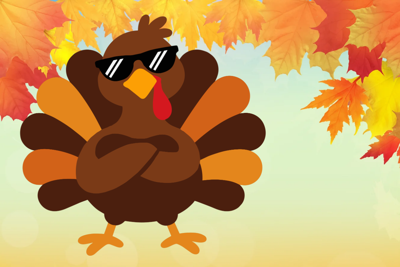 Orange and brown Thankgiving turkey cartoon wearing a sunglasses surrounded by fall leaves